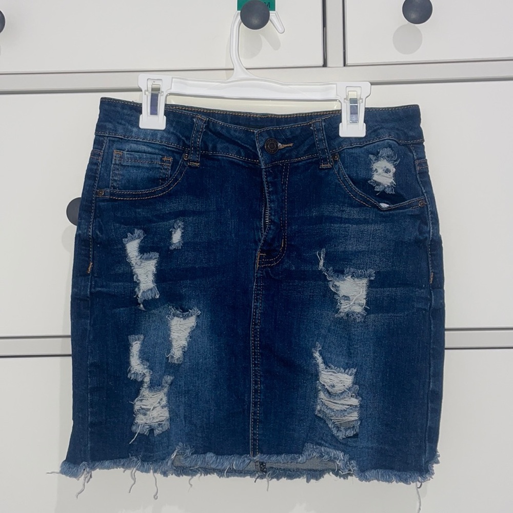 BLUE JEAN SKIRT WITH RIPS
